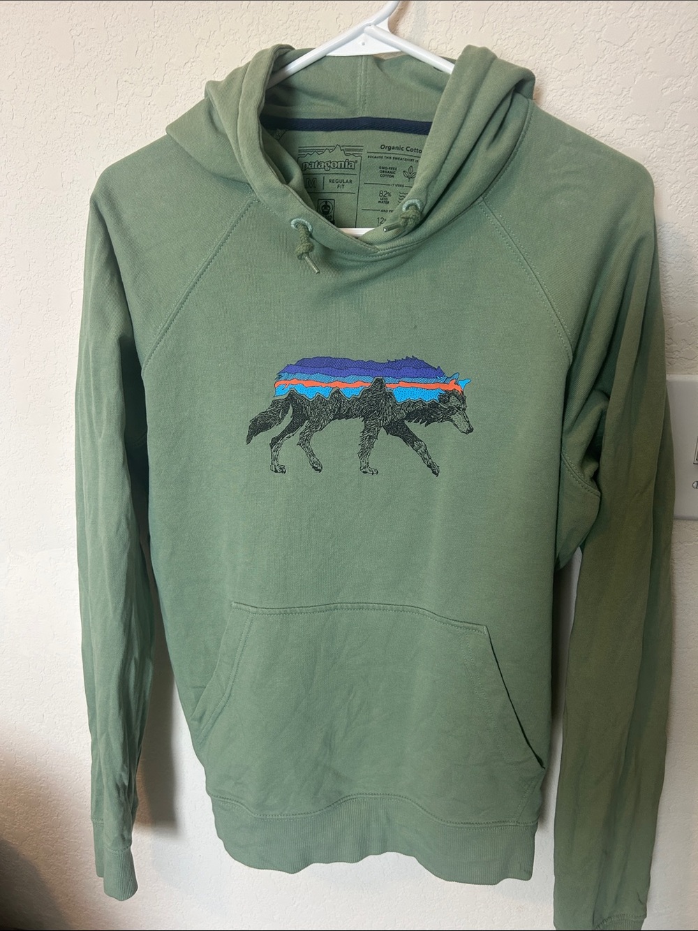 Patagonia Olive Green Pullover Hoodie with Wolf Graphic and Multicolor Stripes